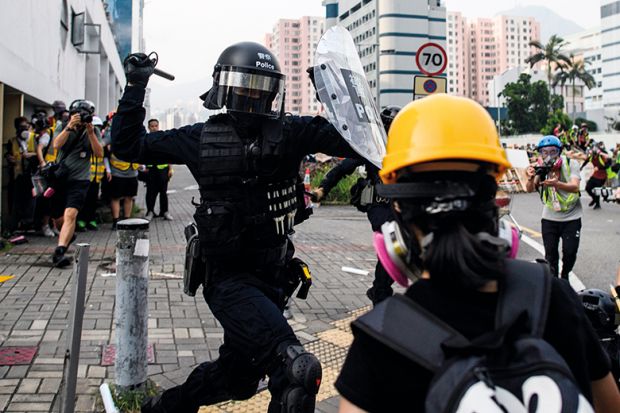 Police clash with protesters in Kowloon Bay, Hong Kong in August 2019