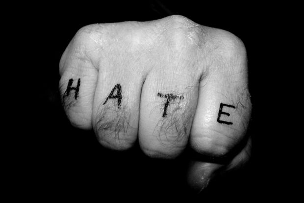 Fist with hate tattoo