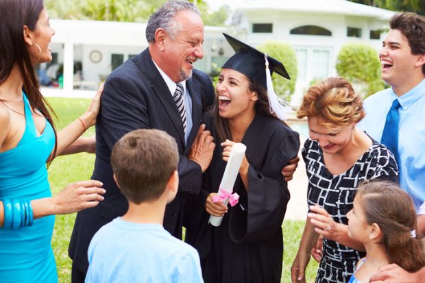 A family celebrates a graduation illustrating opinion article about support ‘first in family’ students in higher education