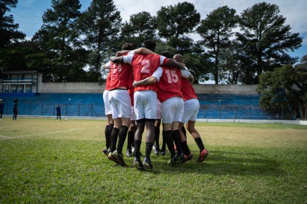  Soccer players celebrating a goal