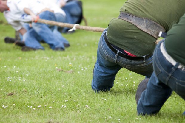 A tug of war contest at a highland games event in Scotland
