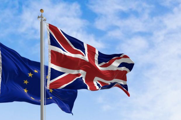Flags of United Kingdom and the European Union waving in the wind
