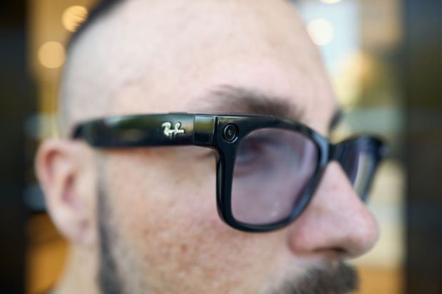 A man wears Google smart glasses