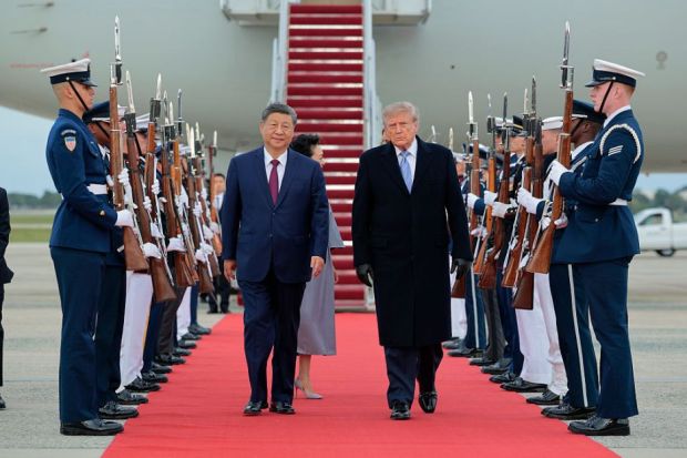U.S. President Donald Trump (R) walks on a red carpet after greeting Chinese President Xi Jinping (L) during an arrival ceremony on September 23, 2026 at Joint Base Andrews, Maryland U.S. President Donald Trump (R) walks on a red carpet after greeting Chinese President Xi Jinping (L) during an arrival ceremony on September 23, 2026 at Joint Base Andrews, Maryland