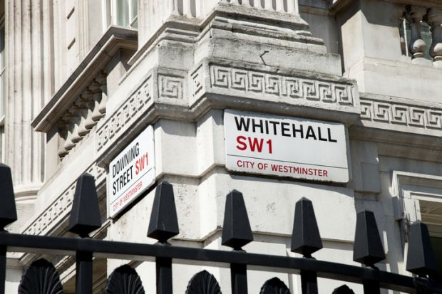 Street signs on the corner of Downing Street and Whitehall. Street signs on the corner of Downing Street and Whitehall.