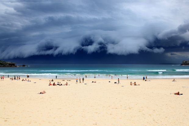 Beach goers enjoy the last rays of sunshine before a massive storm sweeps through Sydney Beach goers enjoy the last rays of sunshine before a massive storm sweeps through Sydney