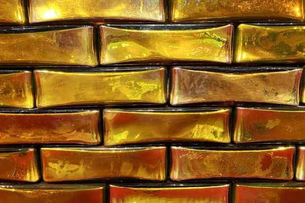 A wall of gold bars, symbolising gold open access in Latin America