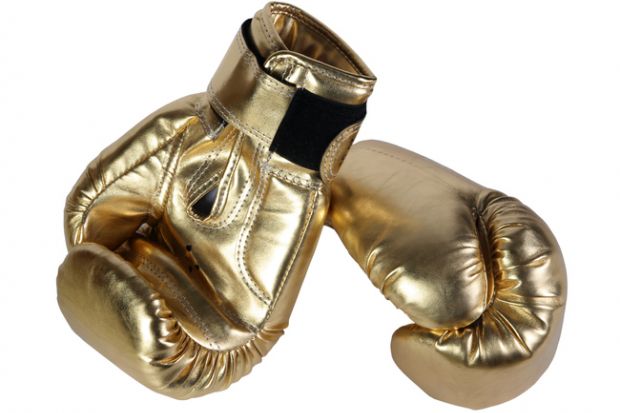 Gold boxing gloves