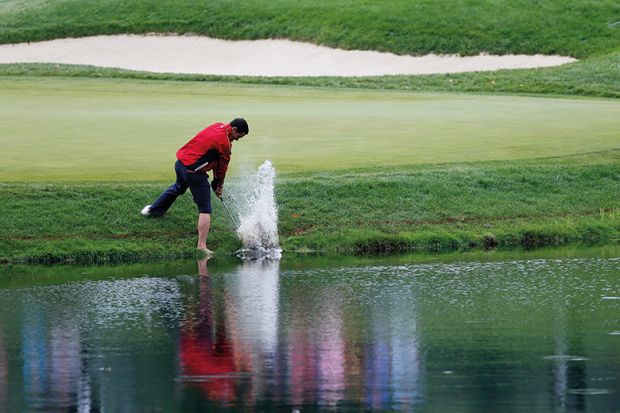 Golfer in water