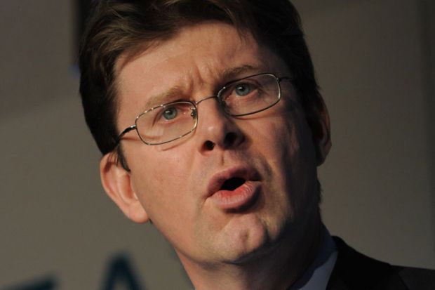 Greg Clark speaking at conference