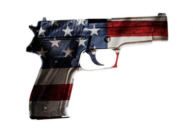 A gun with the colours of the US flag A gun with the colours of the US flag
