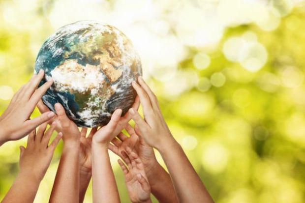 Hands holding up Planet Earth, commitment to United Nations SDGs, THE Impact Rankings 2021 blog