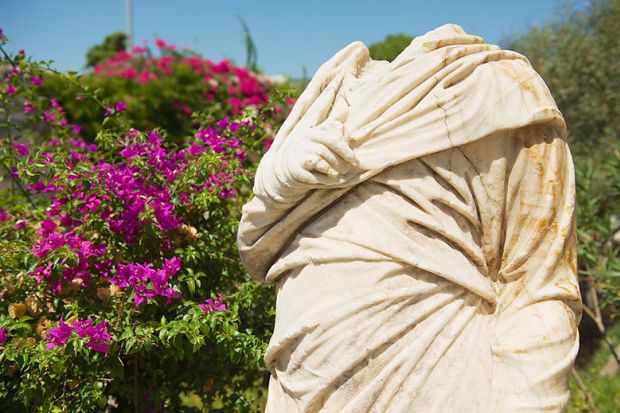 headless statue illustrating op-ed about defending study of Classics