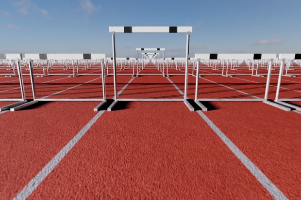A running track with taller hurdles in one lane, symbolising unfairness