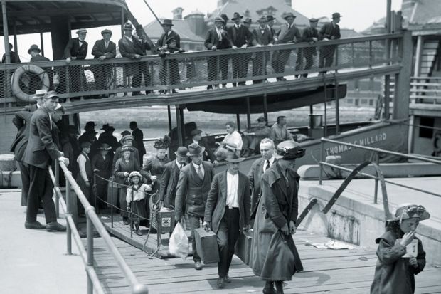 Immigrants disembarking boat, Ellis Island, New York City