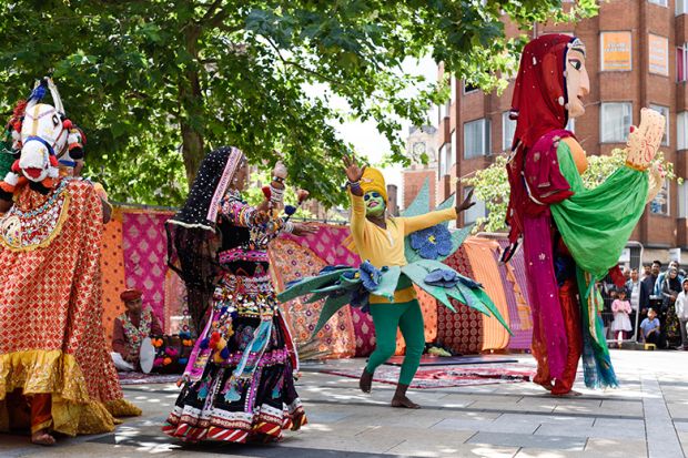 Performers at the Leicester Belgrave Mela, with a tree in the background. To illustrate the University of Leicester's proposal to set up a branch campus in India. Performers at the Leicester Belgrave Mela, with a tree in the background. To illustrate the University of Leicester's proposal to set up a branch campus in India.