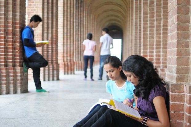 Indian students preparing for an exam