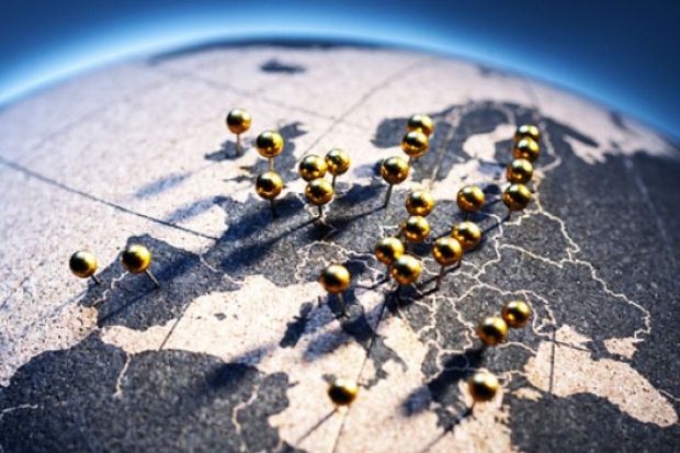 Golden pins in a map of Europe, illustrating integration Golden pins in a map of Europe, illustrating integration