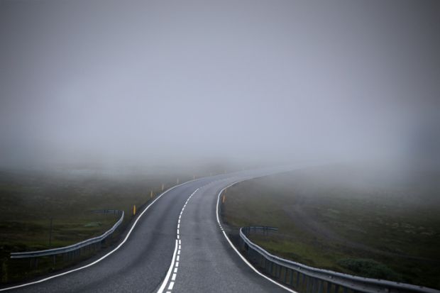 Road leading into mist