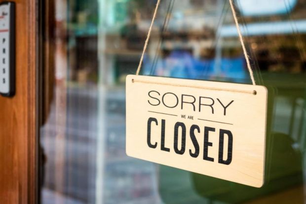 Sign saying: ‘Sorry, we are closed’
