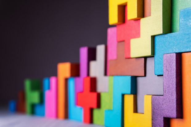 Cracking the puzzle of learning design in academia A puzzle of brightly coloured shapes, representing the challenge of working out the best way to design learning for students