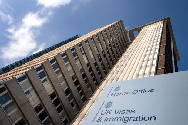 British immigration concept with Lunar House building the Home Office Visas and Immigration Office in Greater London, England, UK