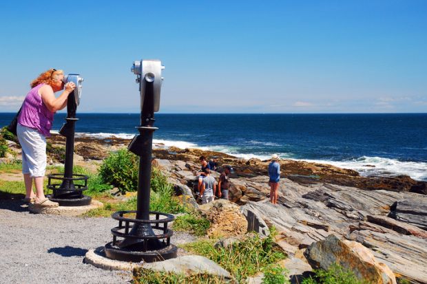 Looking through a view finder out to sea.
