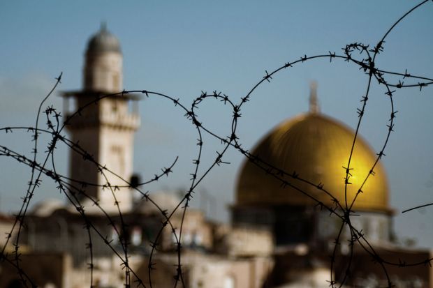 Jerusalem seen through barbed wire