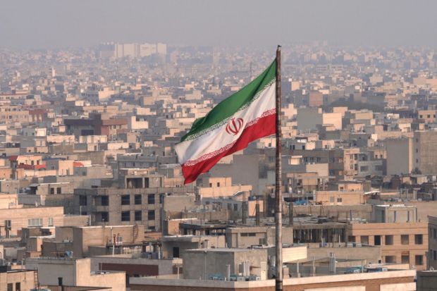 Iranian flag flying in wind Iranian flag flying in wind