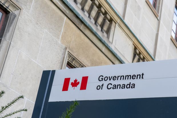 Government of Canada sign outside the office building in Ottawa, Ontario, Canada. Government of Canada sign outside the office building in Ottawa, Ontario, Canada.
