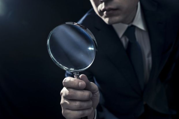Businessman Peering Through Magnifying Glass Businessman Peering Through Magnifying Glass