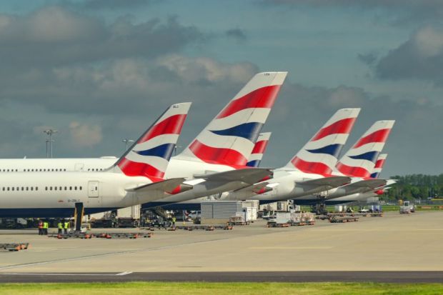 Tail fins of planes operated by British Airways at London Heathrow airport. Tail fins of planes operated by British Airways at London Heathrow airport.