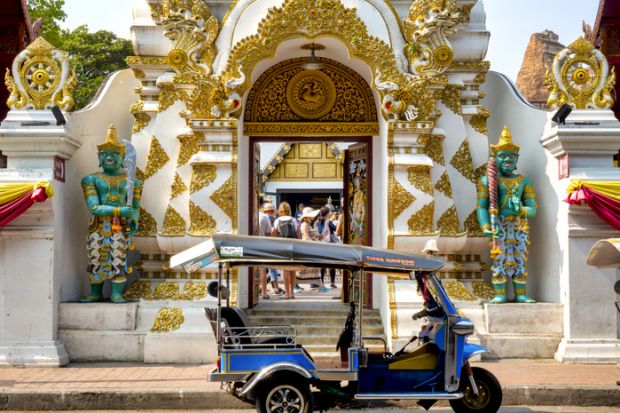 Tuk tuk in front of the entrance of Wat Chedi Luang, Chiang Mai, Thailand, Tuk tuk in front of the entrance of Wat Chedi Luang, Chiang Mai, Thailand,