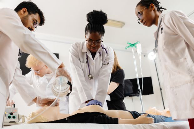 Healthcare professionals practicing cpr and iv insertion during medical training