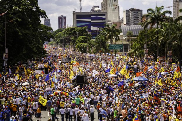 Supporters of Venezuelan Presidential candidate Enrique Capriles Radonski in parade