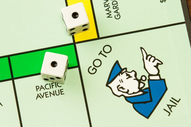 The game of Monopoly with it's well known "GO TO JAIL" section