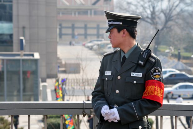 Chinese policeman guards in Beijing, China. 