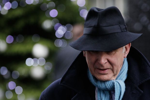 Vince Cable in a fedora hat