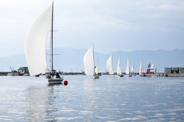 Sailboats entering the finish of the Fiumanka regatta in Rijeka, Croatia.