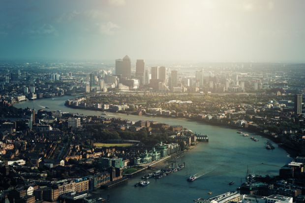 Thames River and Canary Wharf in London Thames River and Canary Wharf in London