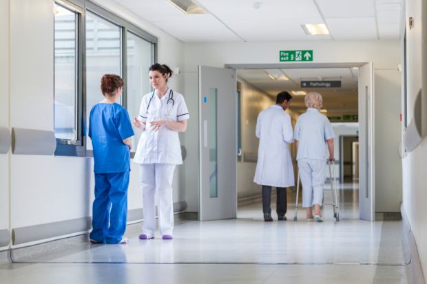 Patients and medics in a hospital Patients and medics in a hospital