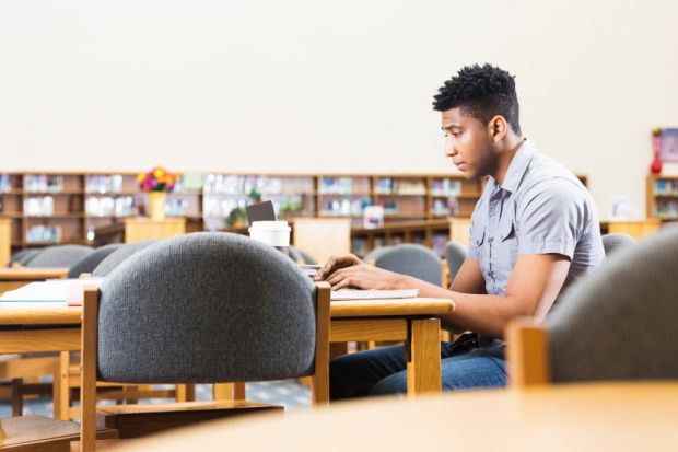 Black student in university library