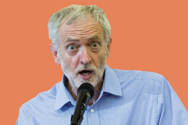 Jeremy Corbyn speaking into microphone Jeremy Corbyn speaking into microphone