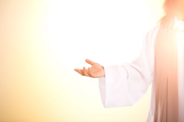 Jesus, his arms outstretched Jesus, his arms outstretched