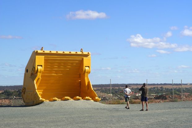 Kalgoorlie, Australia - May 18, 2007 mechanical shovel with the goldmine of Kalgoorlie to show to the tourist the real size of the machine