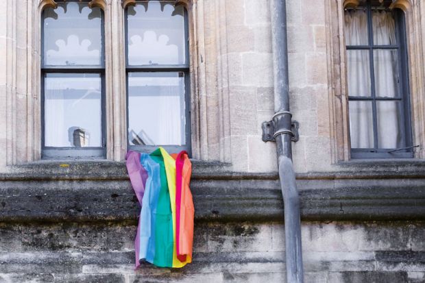 LGBT rainbow flag hanging outside university building