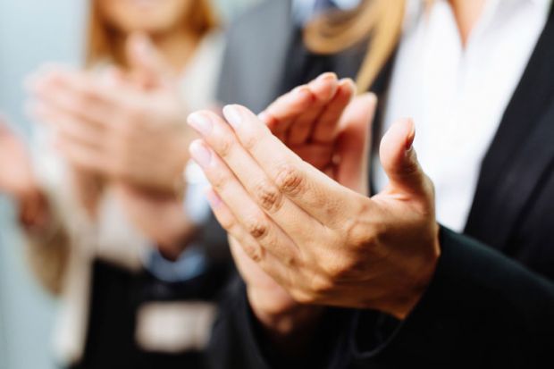 Line of people applauding Line of people applauding