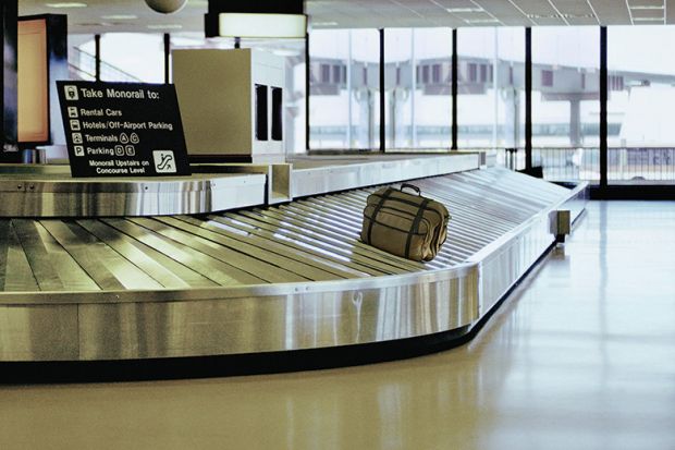 Luggage on airport carousel