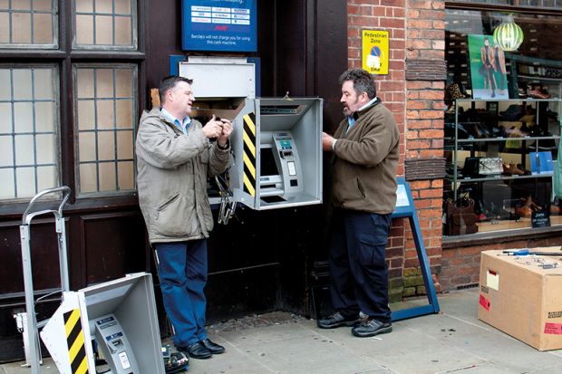 removing cash machine from wall
