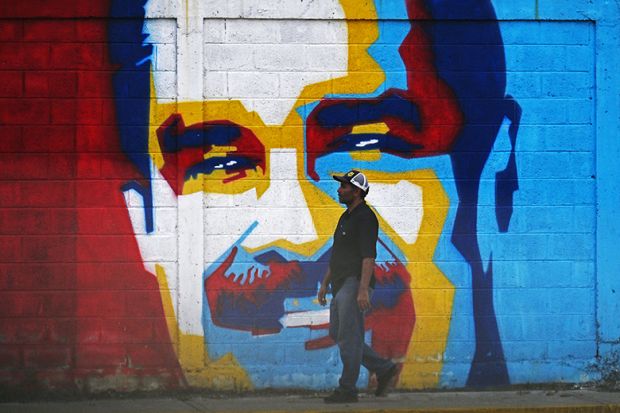 A man walks past a mural depicting Venezuelan President Nicolas Maduro in Caracas on January 3, 2026. A man walks past a mural depicting Venezuelan President Nicolas Maduro in Caracas on January 3, 2026.